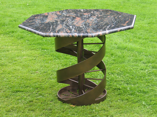 Helix table: powder coated black bronze with granite top, PMF Designs